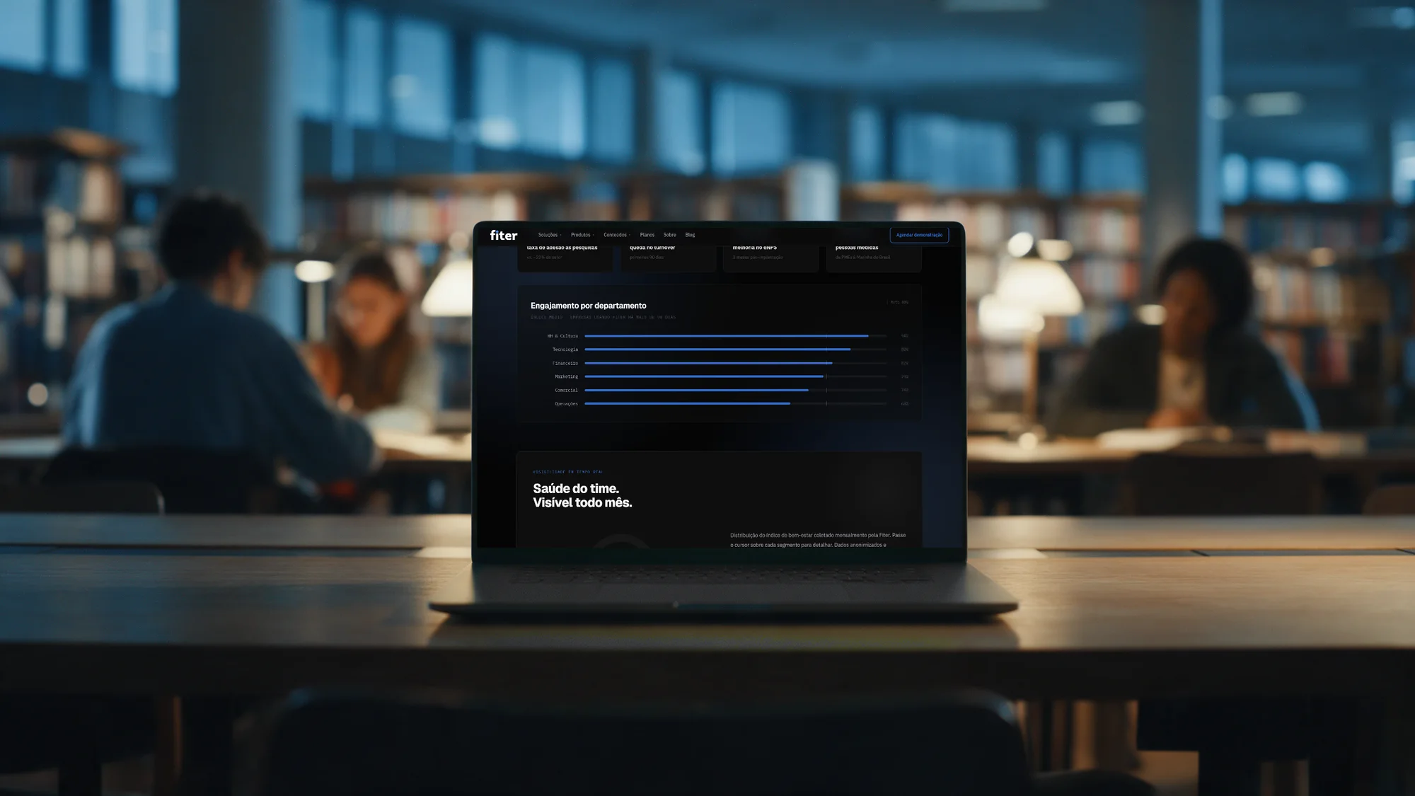 Fiter's engagement dashboard on a laptop in a university library