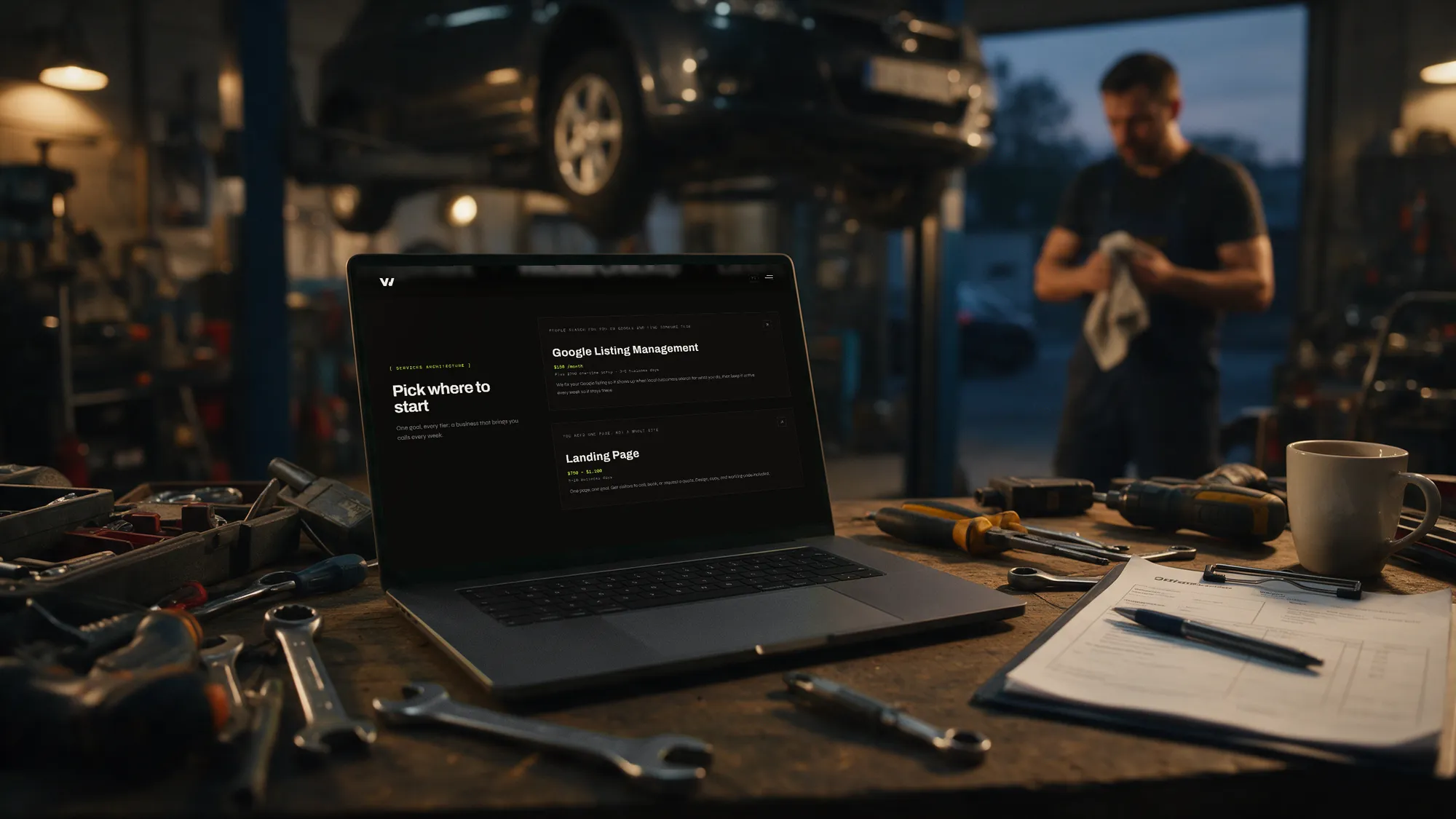 The Vellumwire pricing section on a laptop on an auto repair workbench